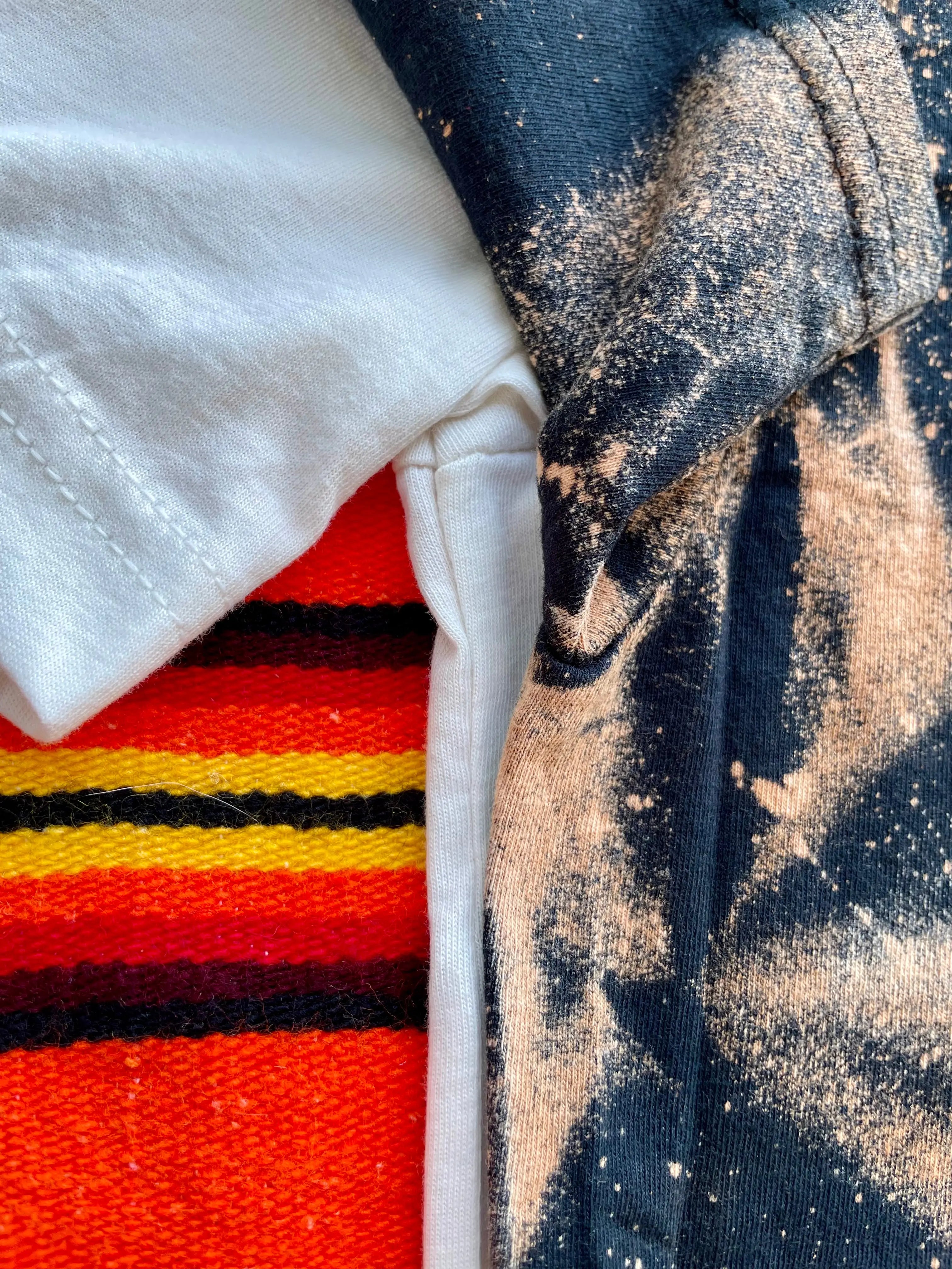 Faith‑inspired Western graphic tee with bleach stain rustic style sleeve view