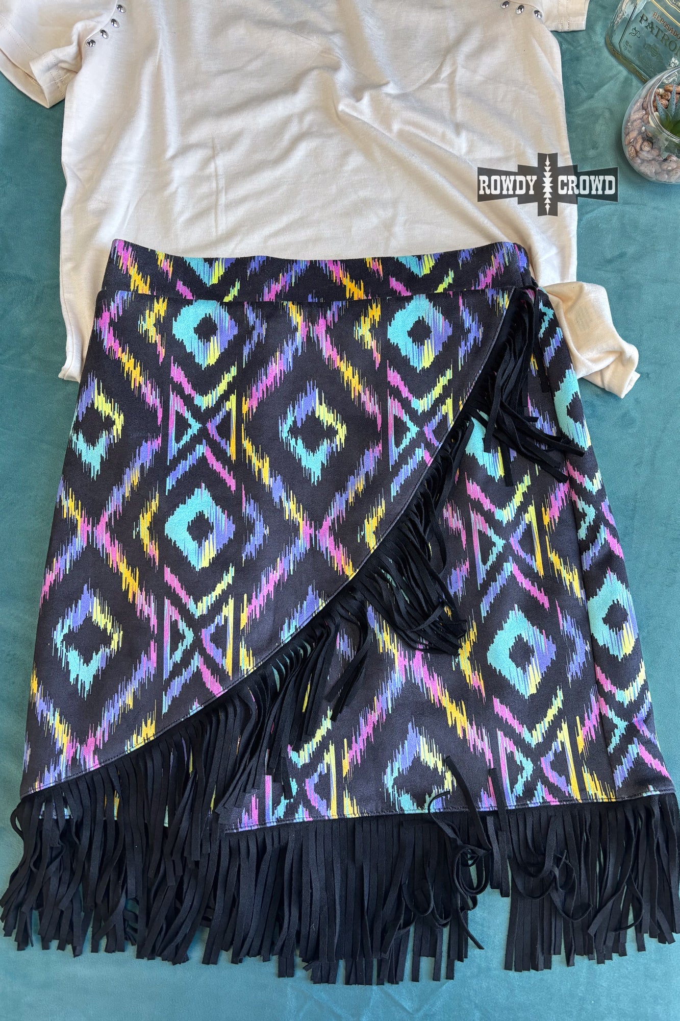 Colorful graphic and a patterned Rowdy Crowd Far Off Fringe skirt
