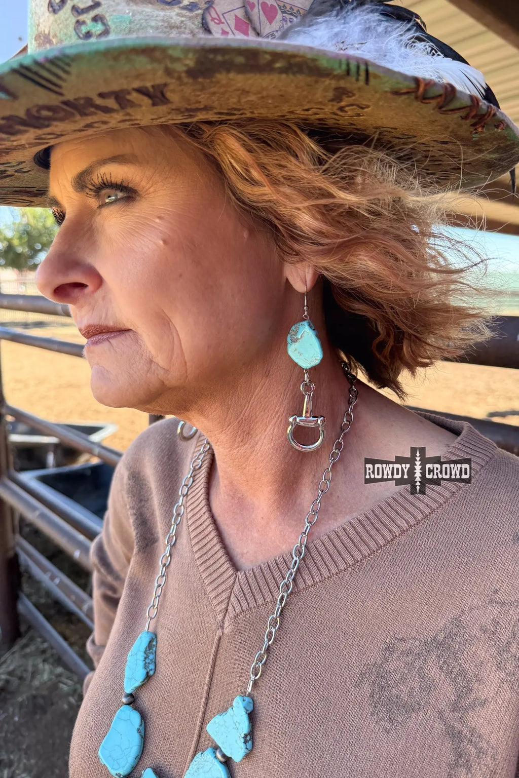 Western earrings with turquoise stone and silver snaffle bit drop