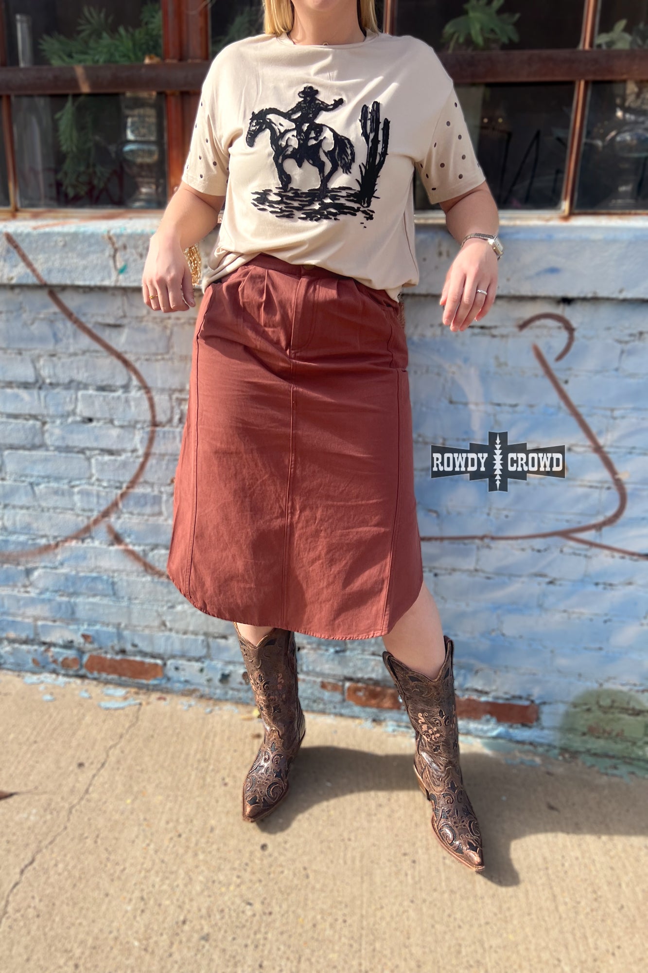 Rowdy Crowd white blouse with black embroidery and brown skirt 