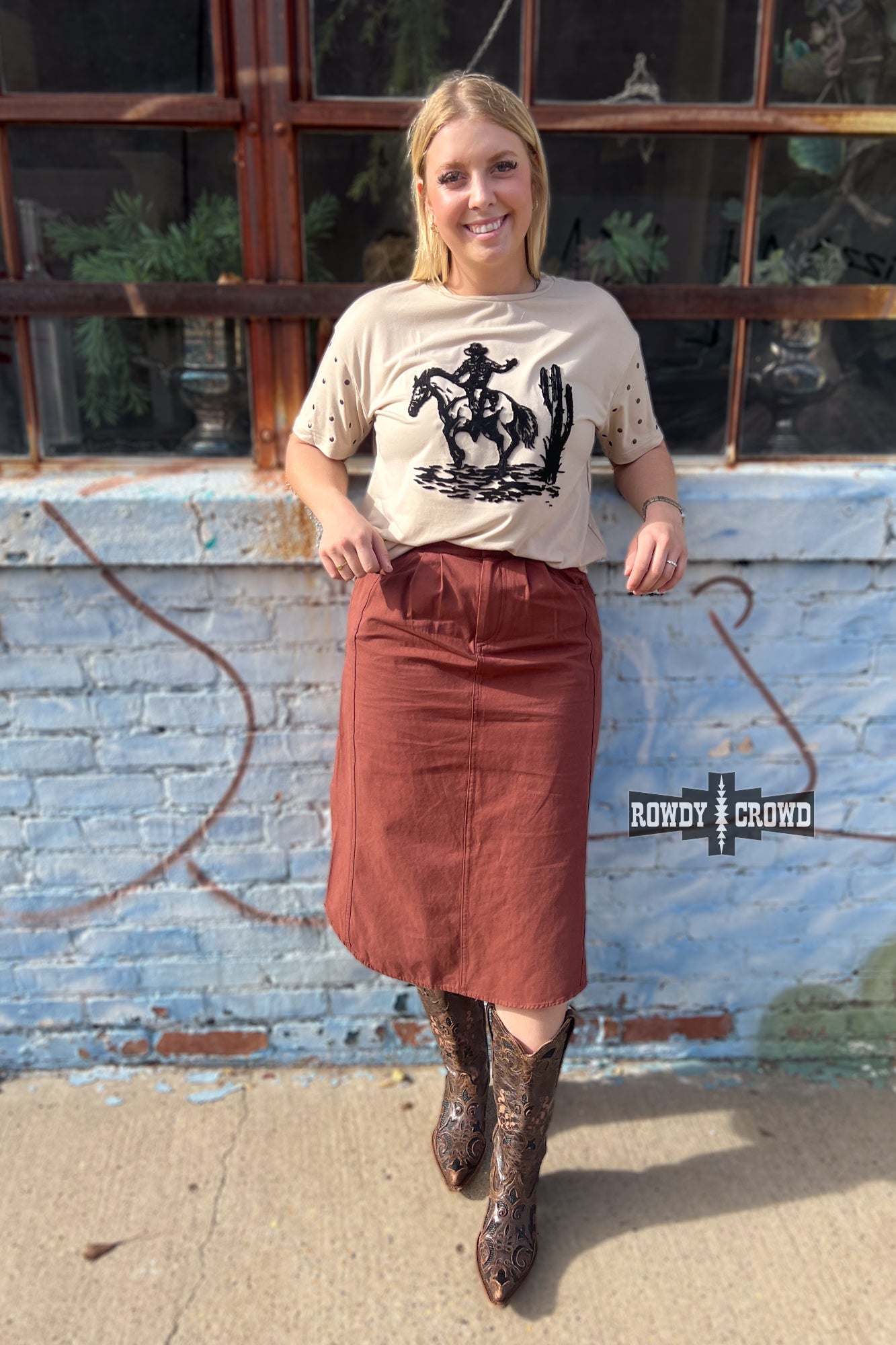 Rowdy Crowd white blouse with black embroidery and brown skirt 