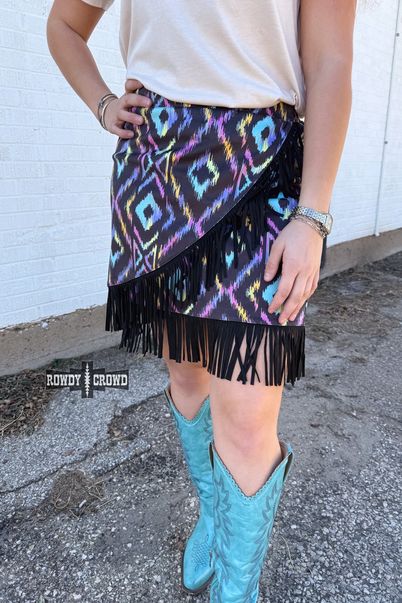 Colorful graphic and a patterned Rowdy Crowd Far Off Fringe skirt