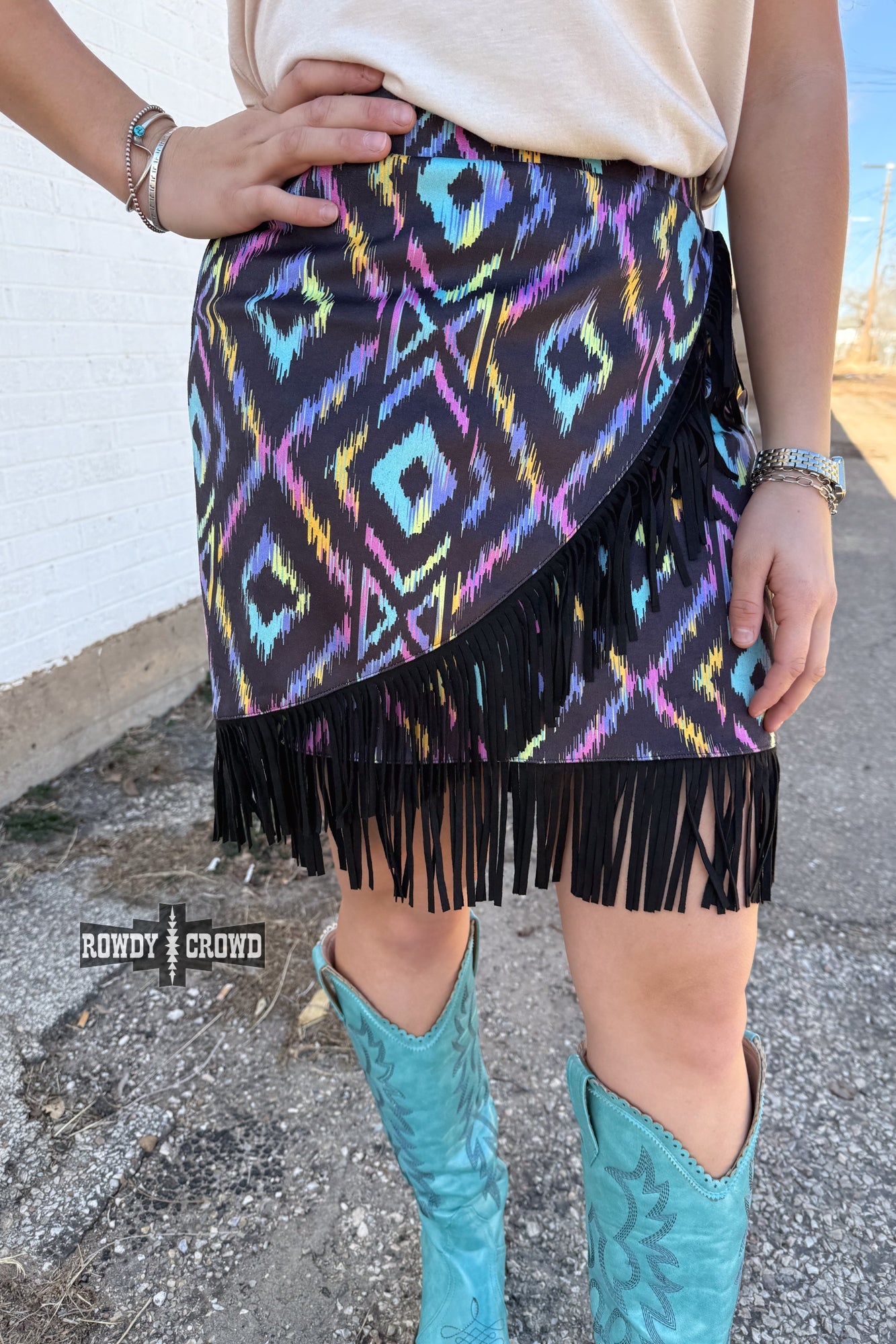 Colorful graphic and a patterned Rowdy Crowd Far Off Fringe skirt