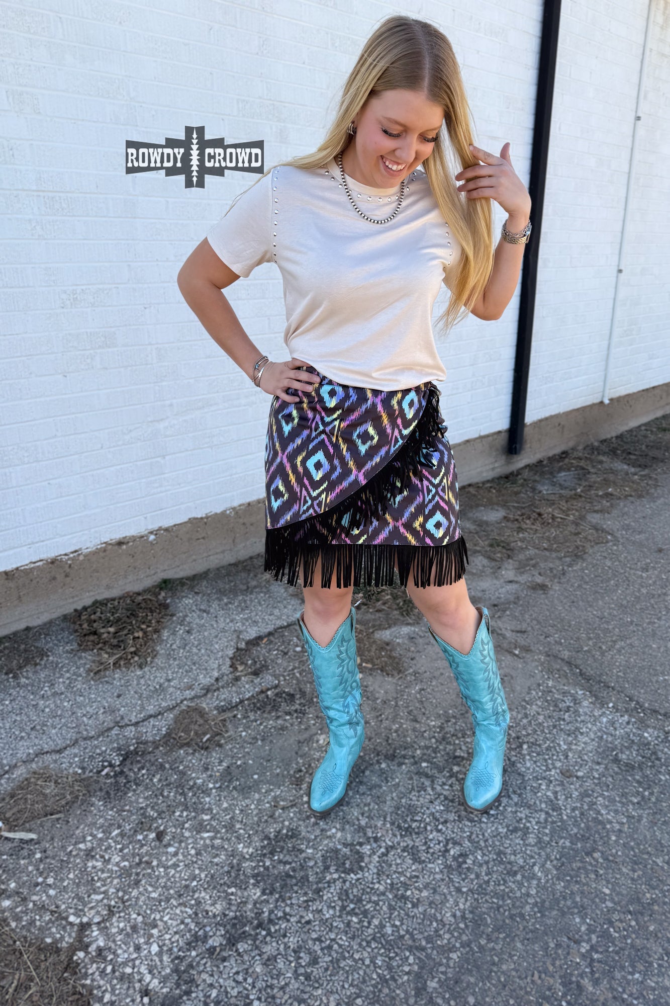 Colorful graphic and a patterned Rowdy Crowd Far Off Fringe skirt