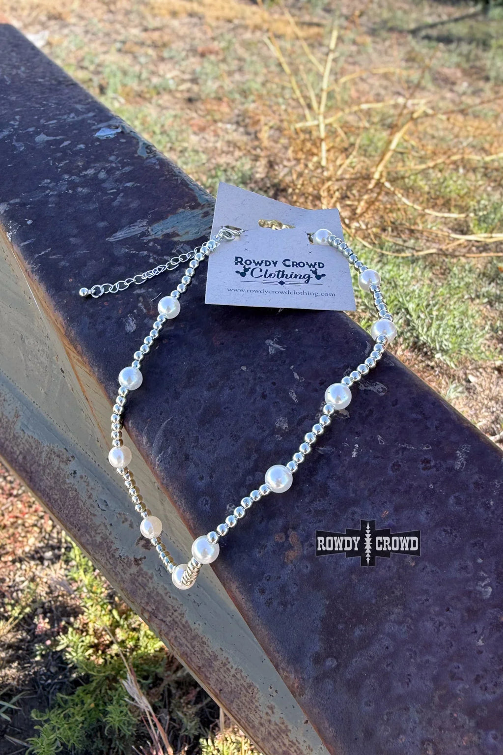 Elegant cowgirl necklace with pearls and silver beads, versatile western accessory

