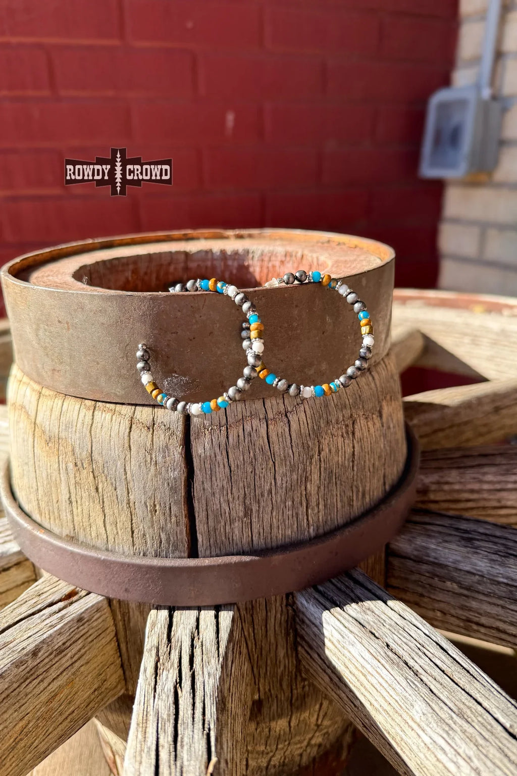 Lightweight western hoops with metallic silver beads, turquoise details, and earthy wood tones

