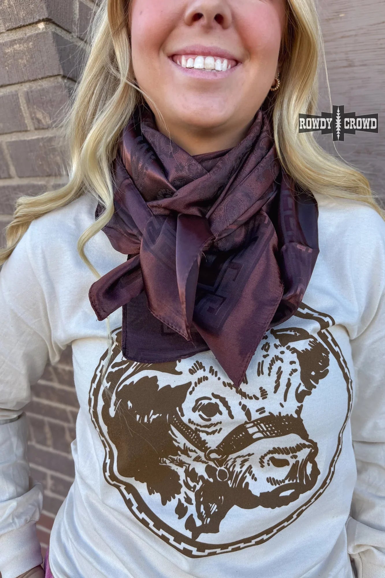 close up of paisley pony wild rag polyester fabric rustic western cowgirl fashion