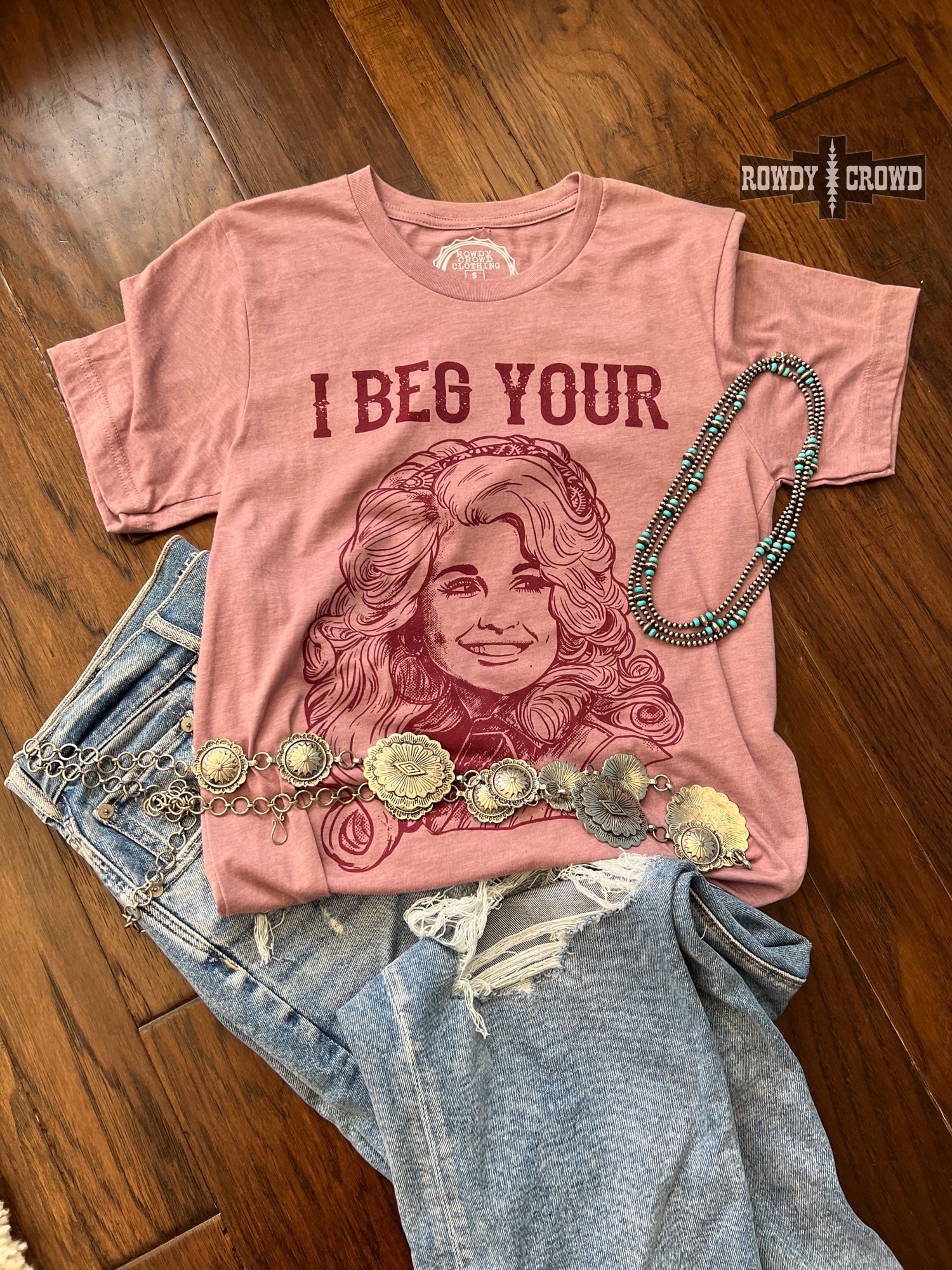 Rowdy Crowd I Beg Your Pardon Tee. Dolly Parton stretchy lightweight heather orchid tee screen print