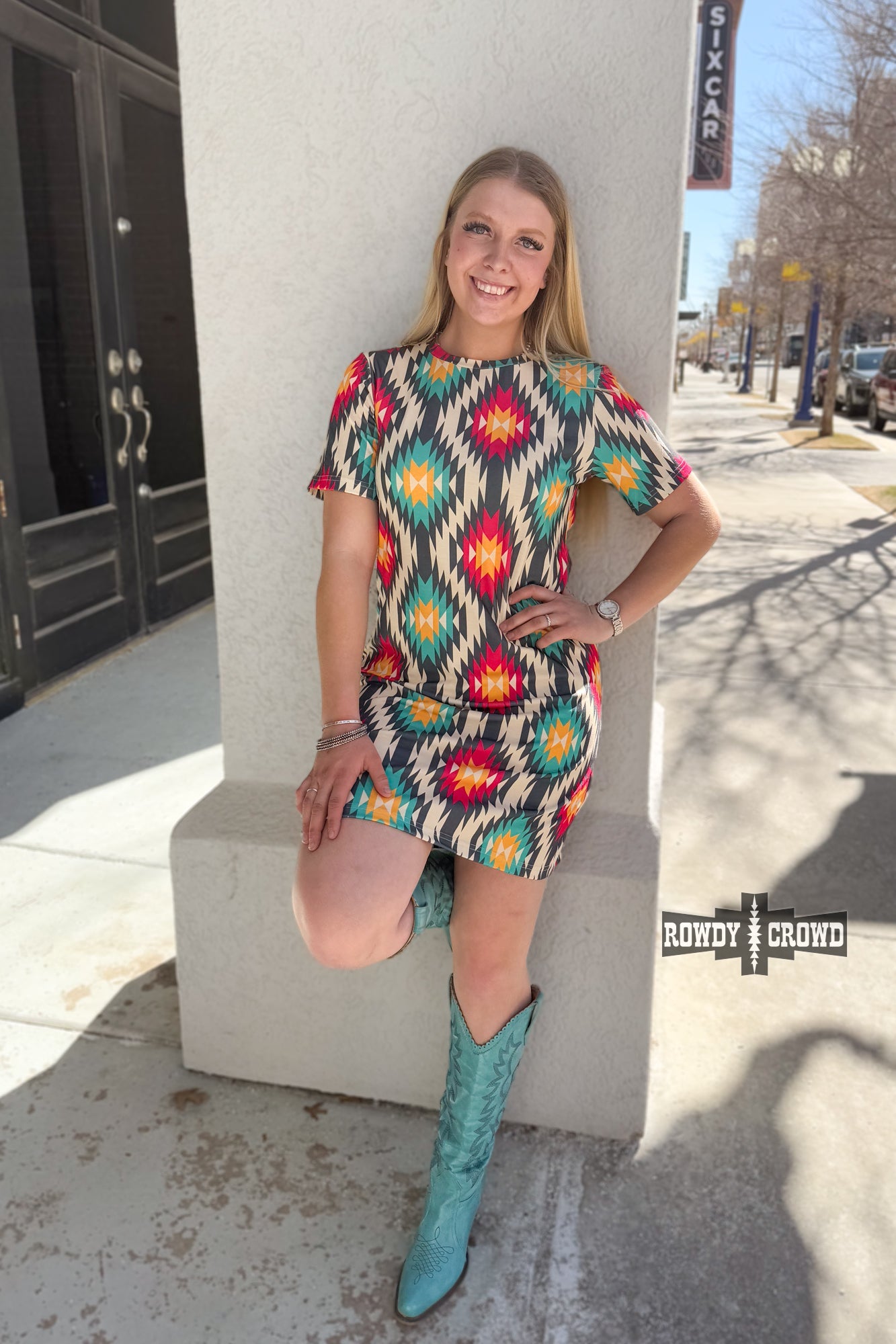 Woman in a Rowdy Crowd colorful Native American print Doc Holliday dress