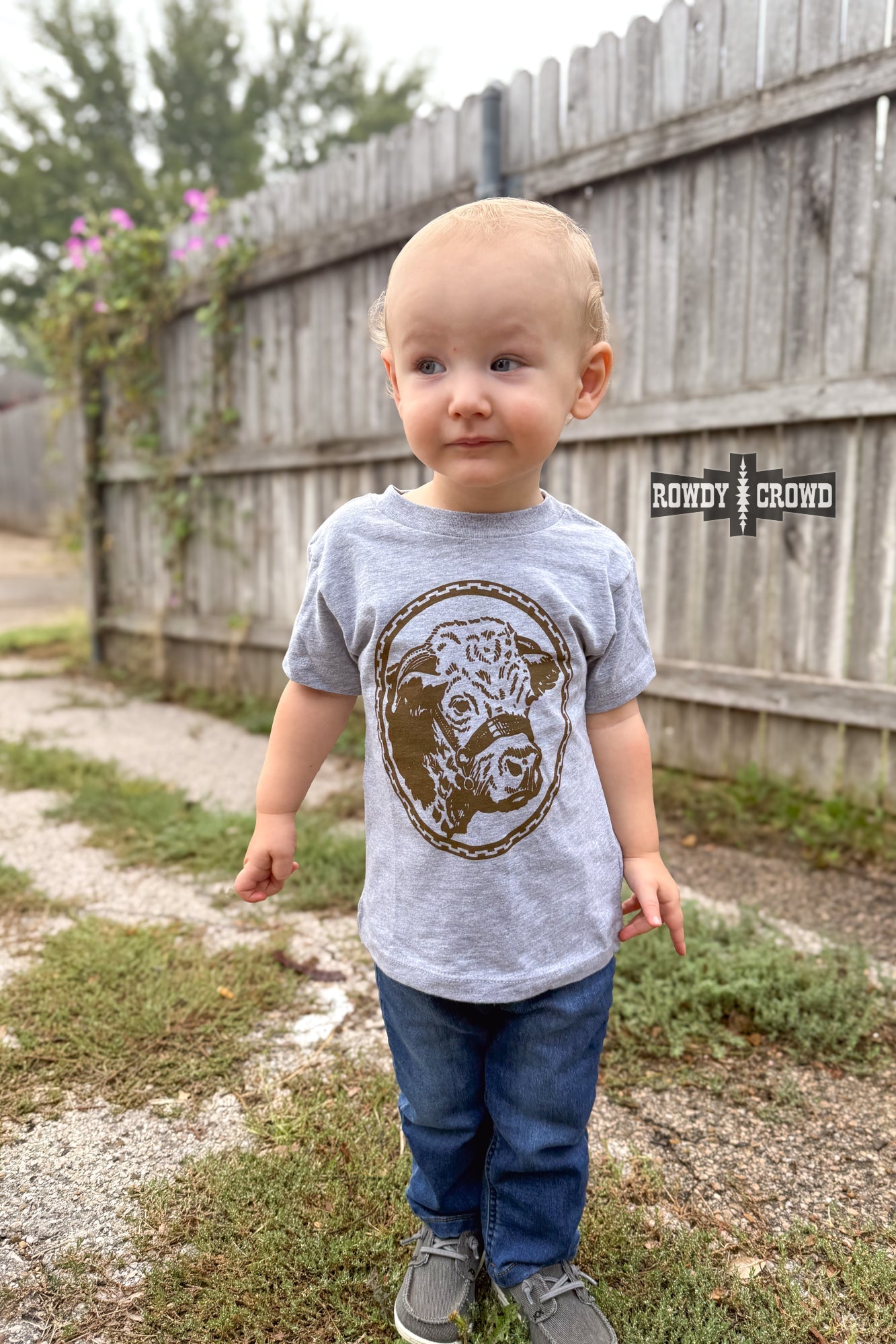 Rowdy Crowd KIDS Happy Hereford tee made from soft and comfy fabric. Features a brown Hereford head on a light grey background
