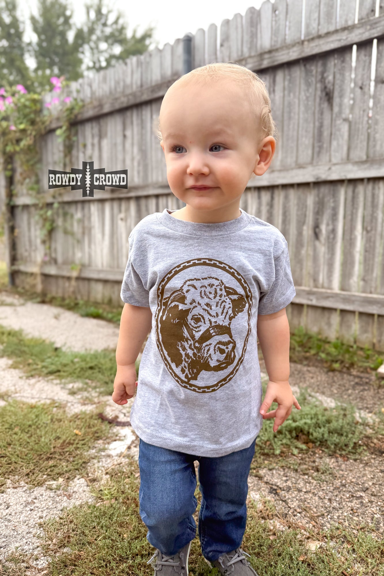 Rowdy Crowd KIDS Happy Hereford tee made from soft and comfy fabric. Features a brown Hereford head on a light grey background