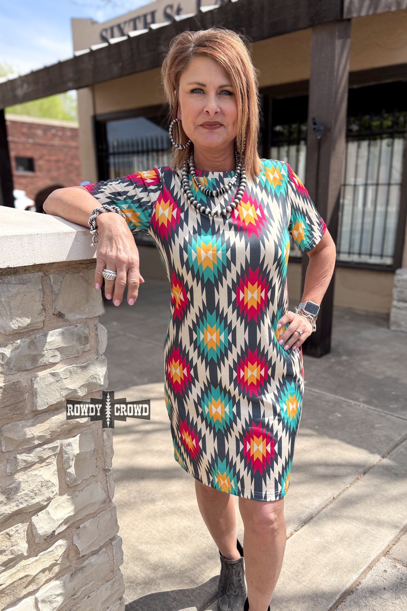 Woman in a Rowdy Crowd colorful Native American print Doc Holliday dress