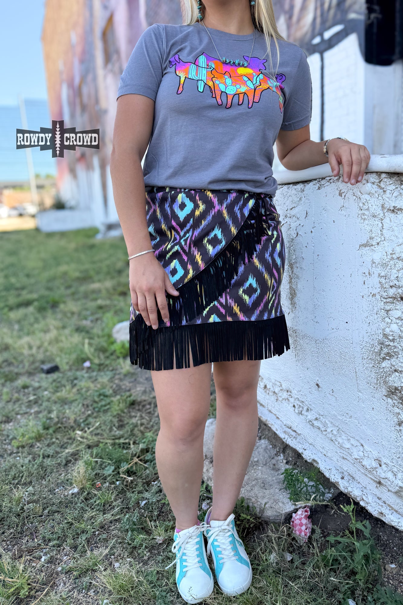 Colorful graphic and a patterned Rowdy Crowd Far Off Fringe skirt