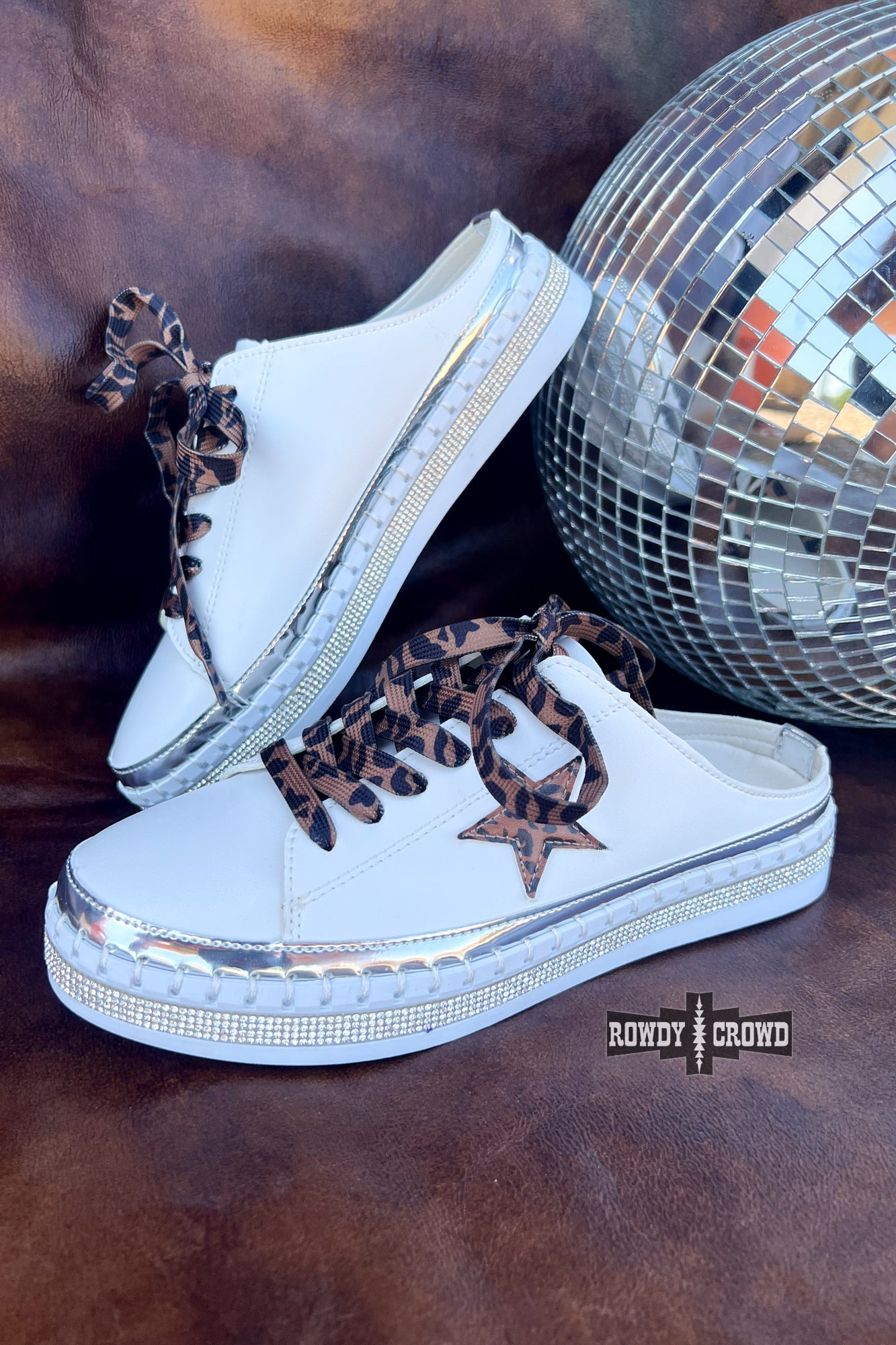 White Rowdy Crowd Silver Spring Slides sneakers with star design and leopard print accents 