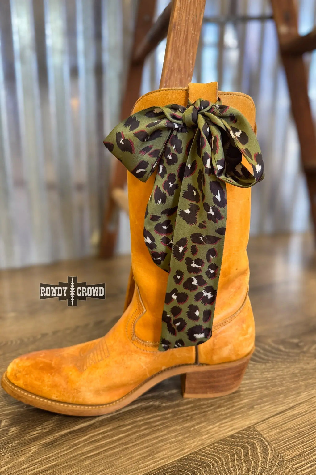 close up of olive leopard twillie scarf silky polyester fabric leopard print western cowgirl accessory