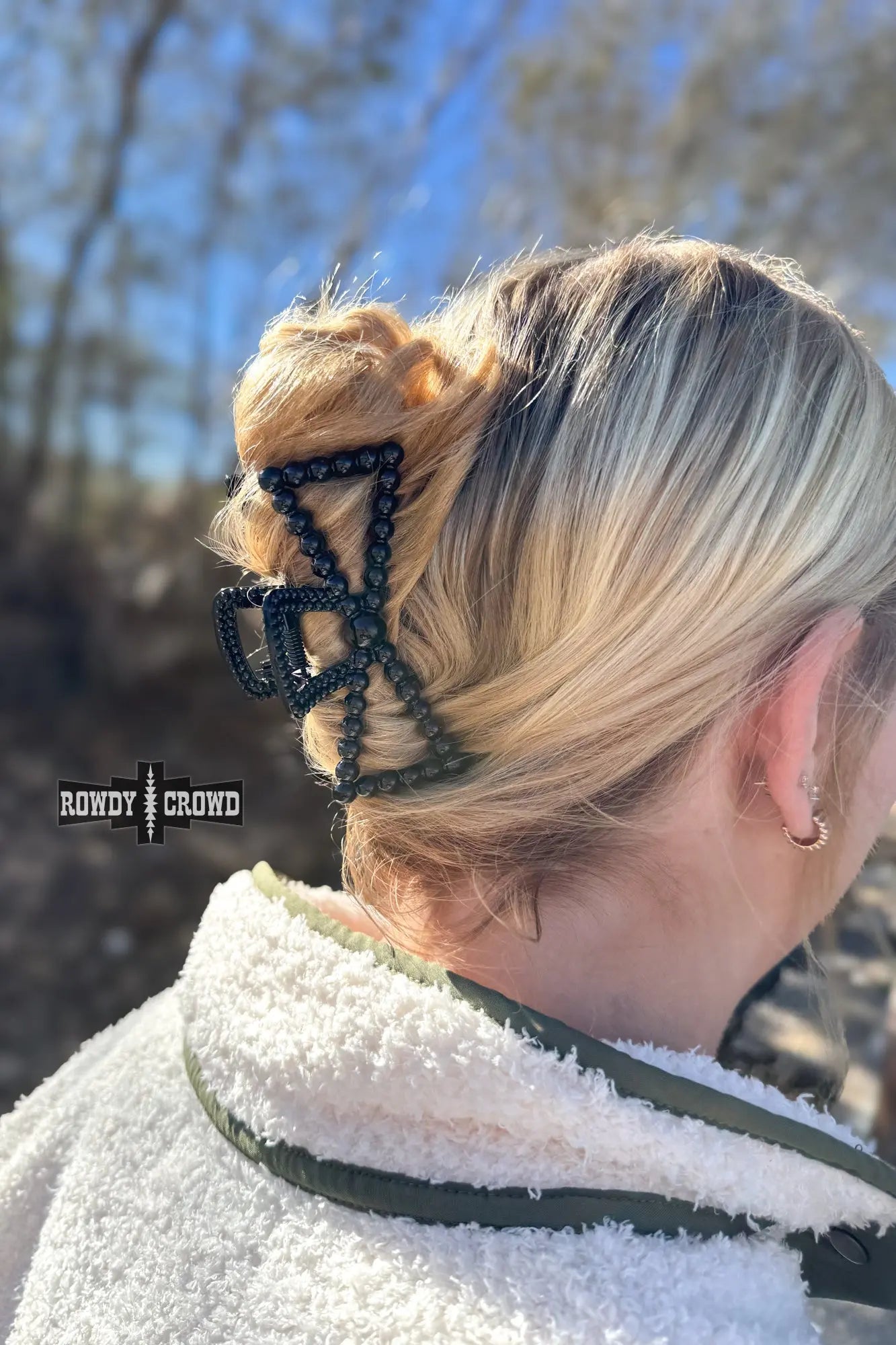 Western hair clip with glossy black beaded bow design