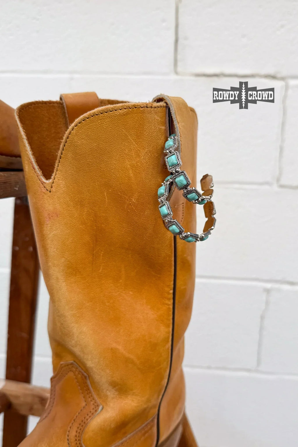 close up of down canyon hoops turquoise stones stamped western detailing cowgirl accessory