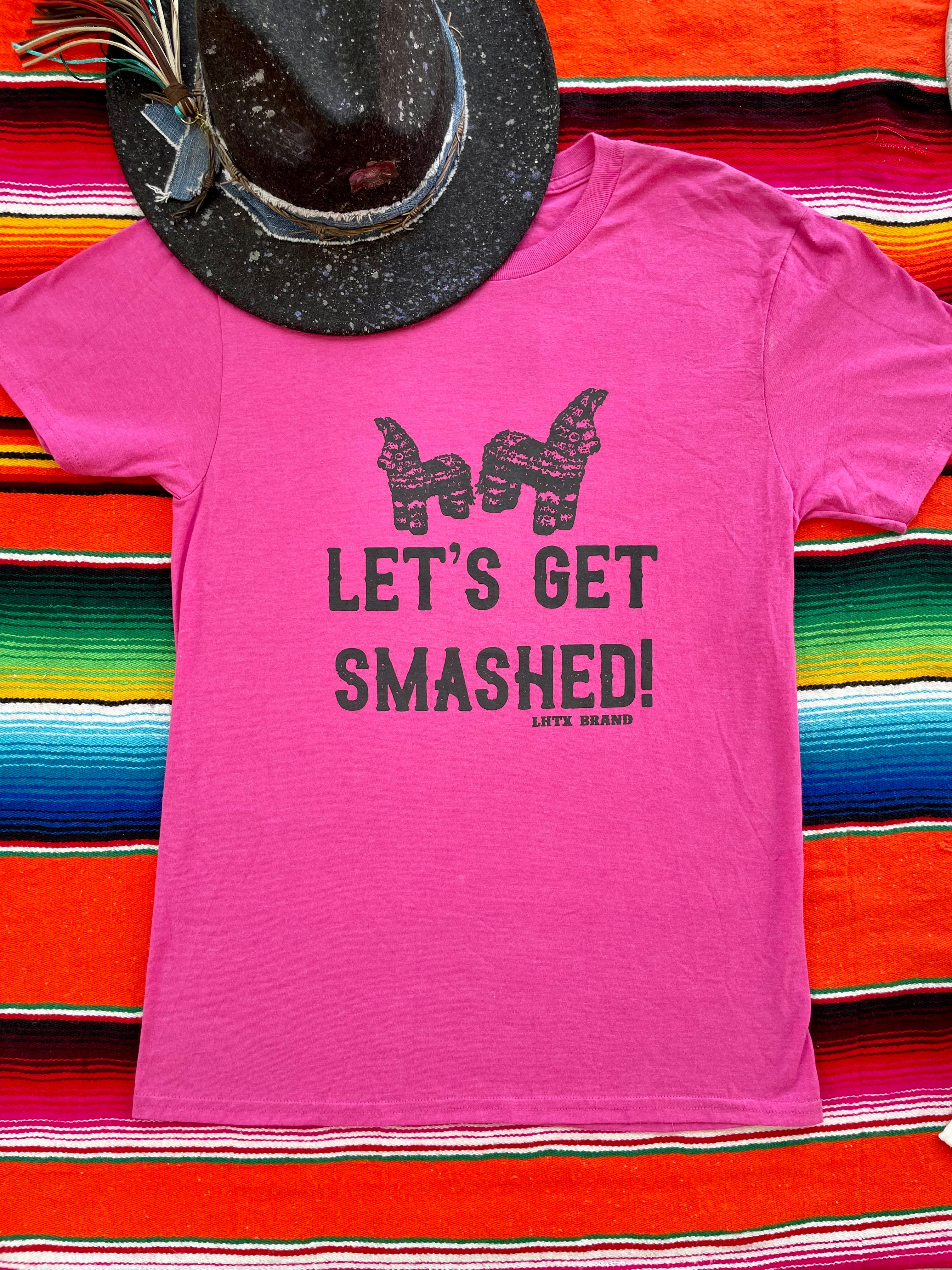 Pink t-shirt with 'Let's Get Smashed!' text on a colorful striped background