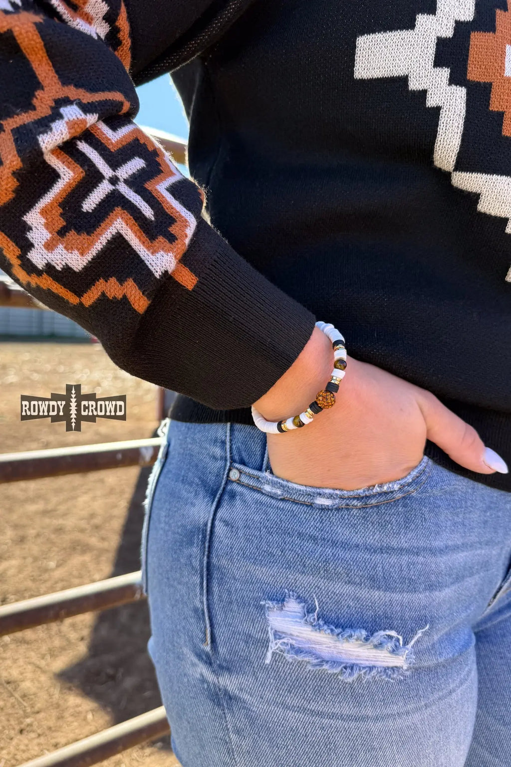 cowgirl wearing westward bracelet bronze sparkle bead western accessory rodeo fashion
