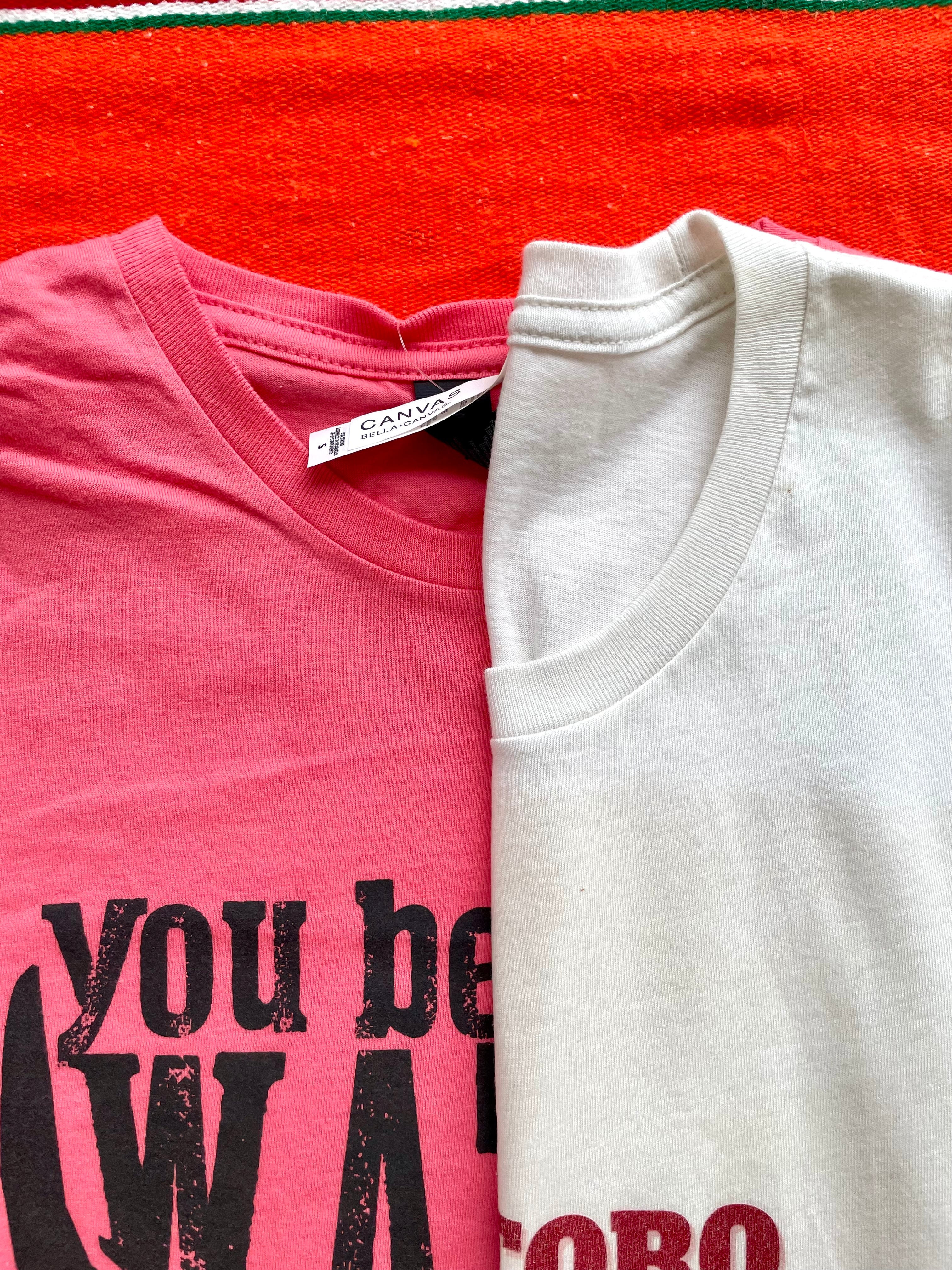 Pink cowgirl graphic t-shirt with "You Bet Your Watusi" slogan and illustrated by LHTX with a hand drawn Watusi bullhead western fashion apparel by the Bucktooth Horse