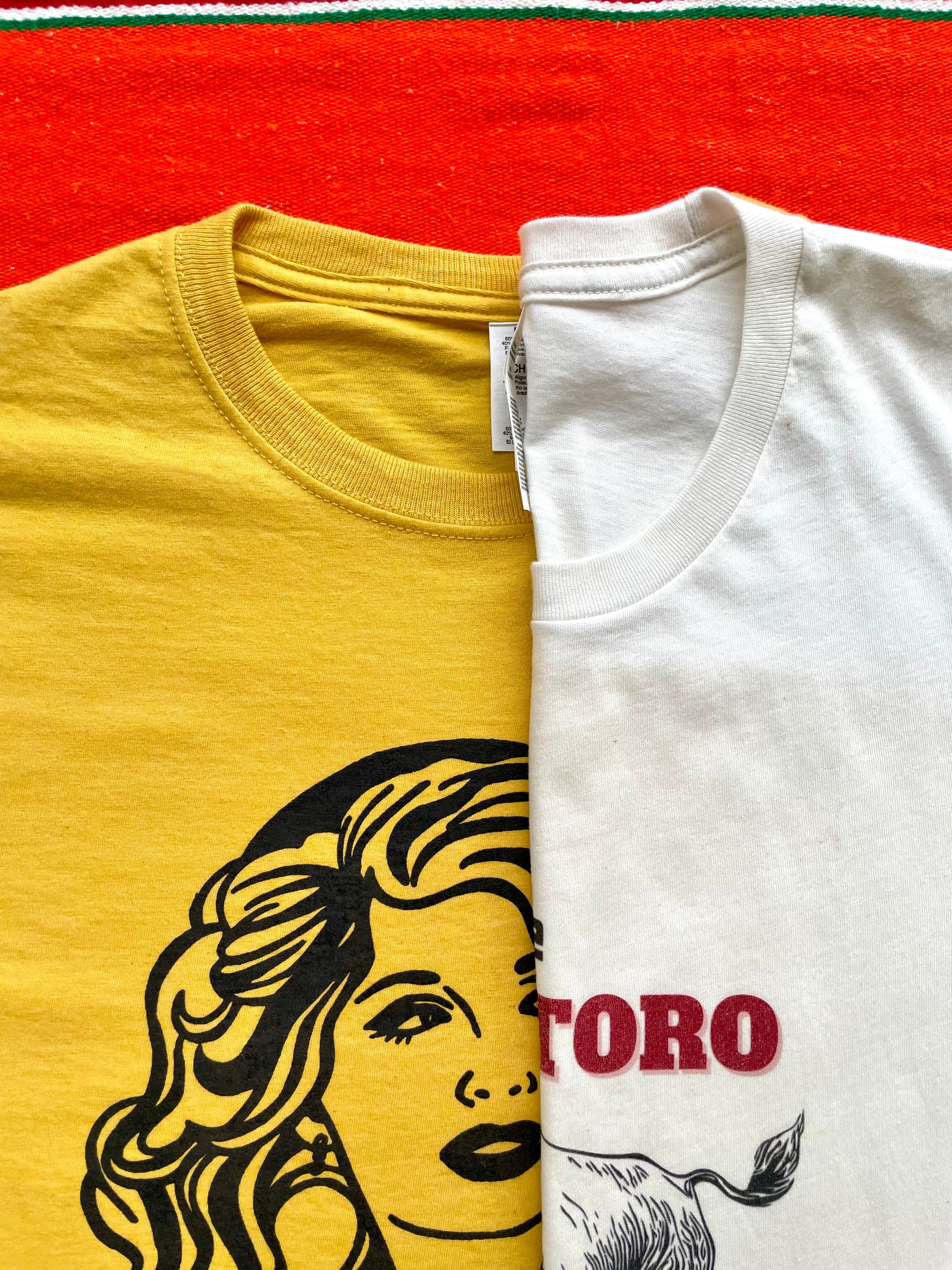 Mustard Yellow Dolly Parton quote graphic tee, "It takes a lot of money to look this cheap", with hand-drawn western design by LHTX, made in Texas—60% cotton, 40% polyester women’s t-shirt featuring bold southern charm and cowgirl style.”
