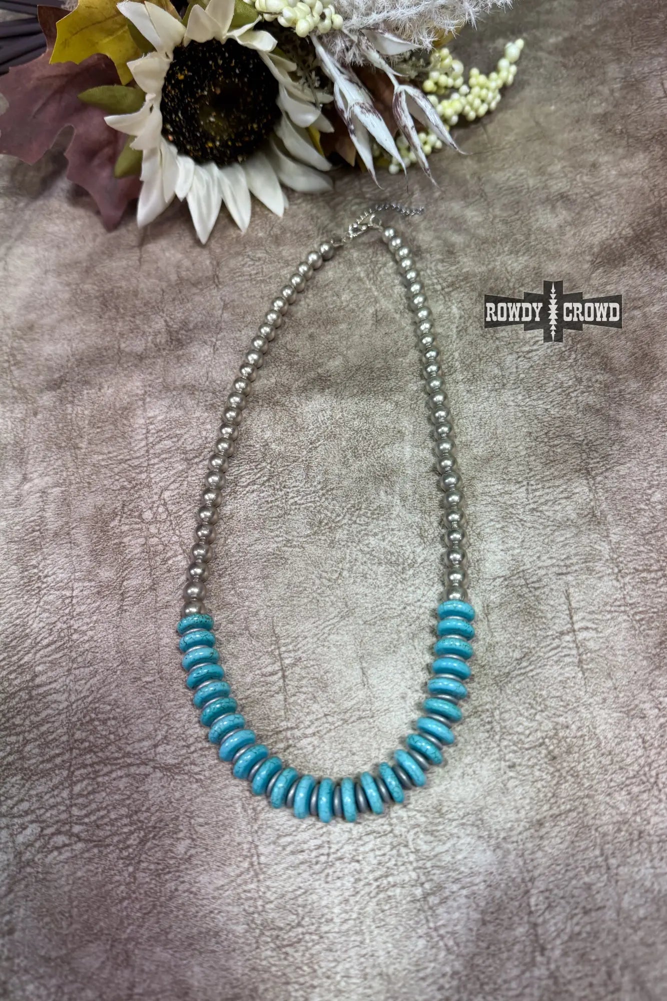 Rustic western necklace blending turquoise beads and silver pearls for bold elegance