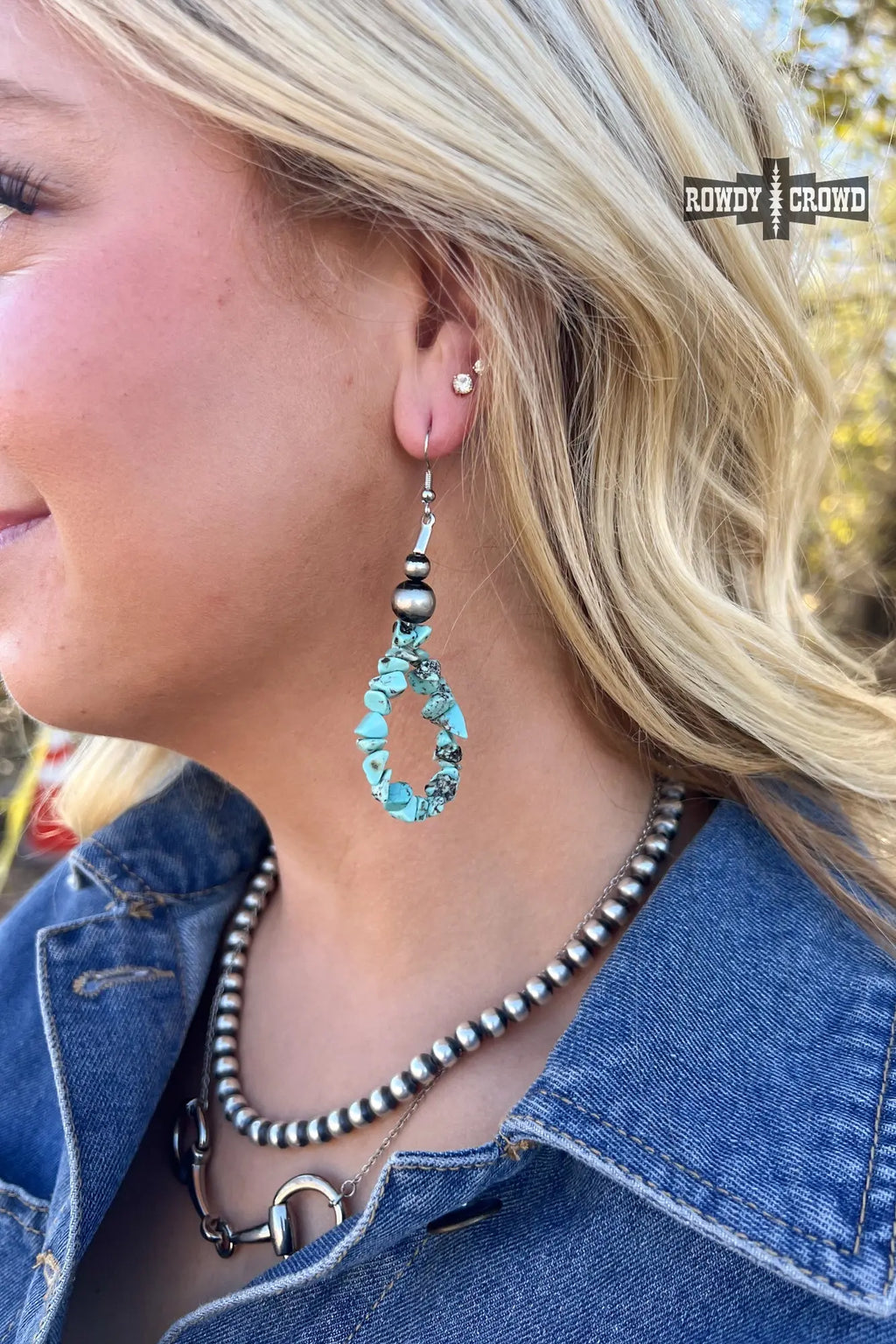 cowgirl wearing way out west earrings turquoise and silver western charm peaceful balanced empowering style